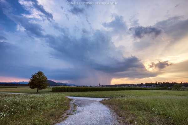 Evening distant storm producing strong rain. 