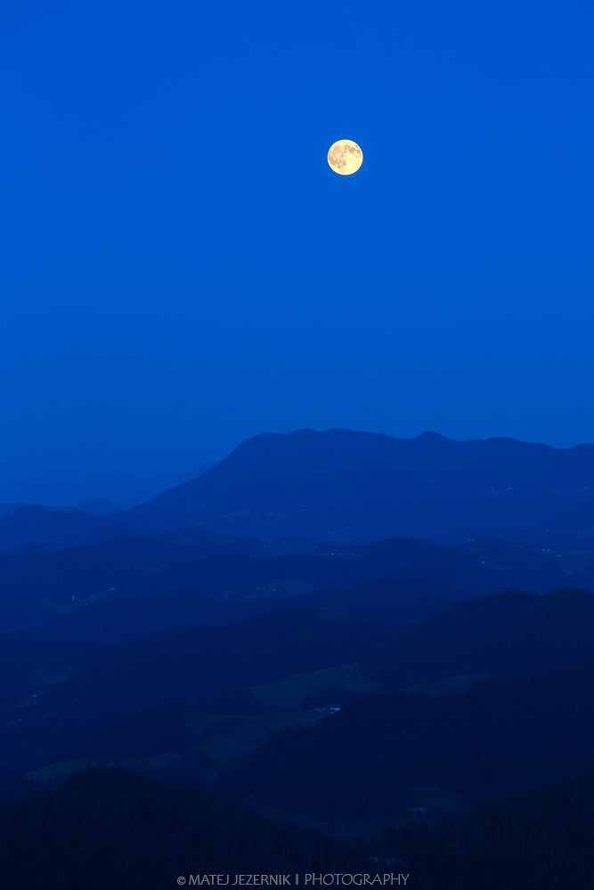 Blue moon rising over the landscape july 2015. 